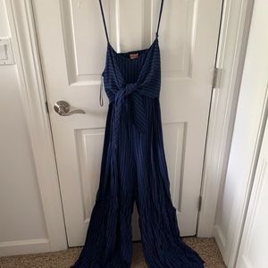 Dress down or dress up backless romper!